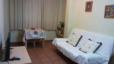 Cama o camas de una habitación en Hostal Sant Roc