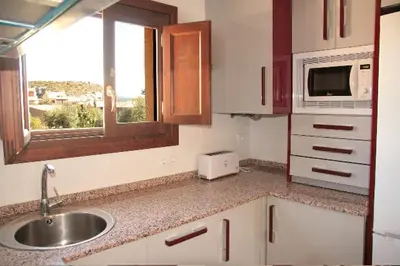 Una cocina o zona de cocina en Apartamento Angel e Isabel