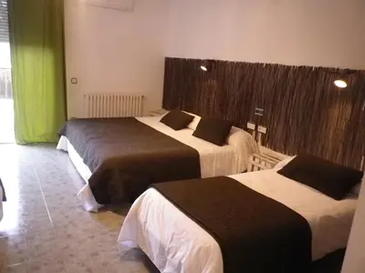 Cama o camas de una habitación en Hotel Rio Piedra