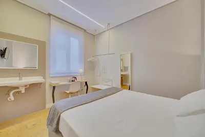 Cama o camas de una habitación en Pensión Mendi