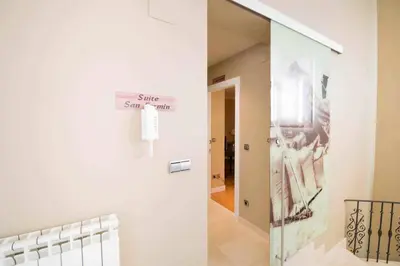 Cama o camas de una habitación en Ver Venir, acogedoras habitaciones con piscina