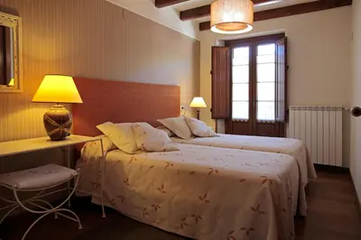 Cama o camas de una habitación en Casa Rural Juliana