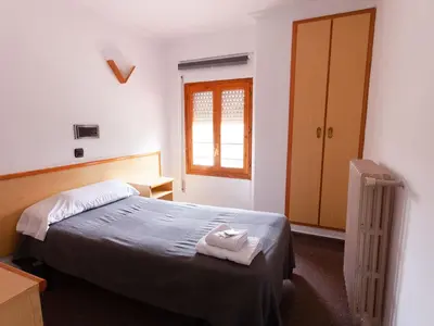 Cama o camas de una habitación en Hostal Gabás