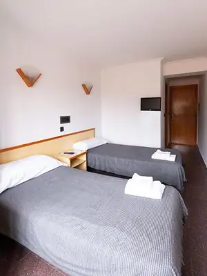Cama o camas de una habitación en Hostal Gabás