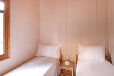 Cama o camas de una habitación en wecamp Pirineos