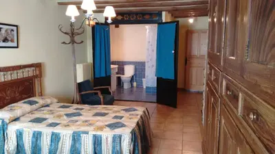 Cama o camas de una habitación en Casa Blasco