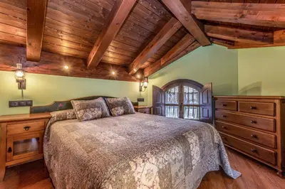 Cama o camas de una habitación en Apartamentos Casa Rivera