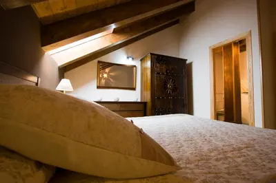 Cama o camas de una habitación en Apartamentos Cañardo Autural