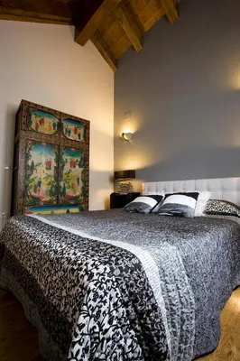 Cama o camas de una habitación en Apartamentos Cañardo Autural