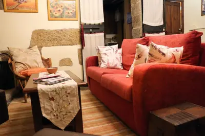 Zona de estar de Posada Abadia de Sietamo