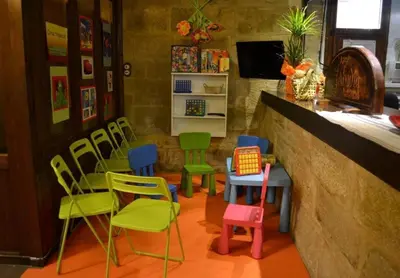 Una televisión o centro de entretenimiento en Posada Abadia de Sietamo