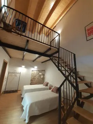 Cama o camas de una habitación en Casa La Foradada