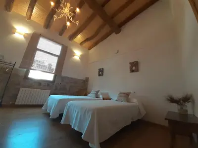 Cama o camas de una habitación en Casa La Foradada