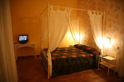 Cama o camas de una habitación en Hostal La Fuente