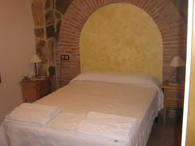 Cama o camas de una habitación en Hostal Sara