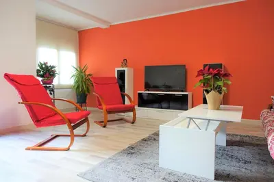 Una televisión o centro de entretenimiento en Apartamento confort I