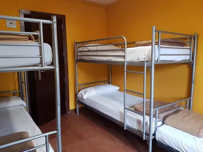 Cama o camas de una habitación en Alberg Les Daines