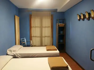 Cama o camas de una habitación en Alberg Les Daines