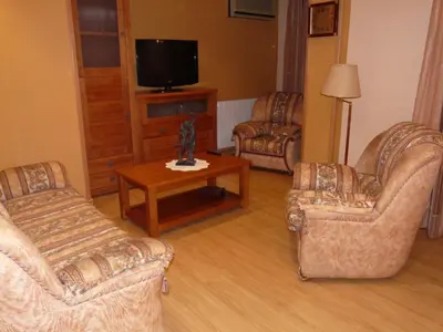 Una televisión o centro de entretenimiento en Apartamento Turístico Guara Casa Castro