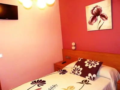 Cama o camas de una habitación en Apartamento Turístico Guara Casa Castro