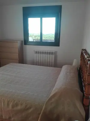 Cama o camas de una habitación en turismo rural del somontano (Alquiler de apartamentos)