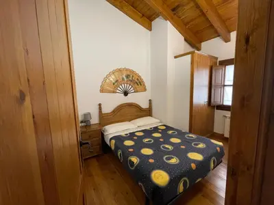 Cama o camas de una habitación en CAN LLORENÇ