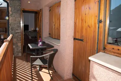 Una televisión o centro de entretenimiento en Apartamento CA L'ANTON con Parking