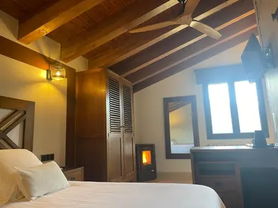 Cama o camas de una habitación en Les Flors - Hotel Rural & Cabanyes