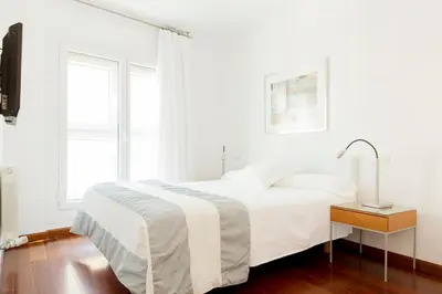 Cama o camas de una habitación en Apartamentos Sabinas El Pilar