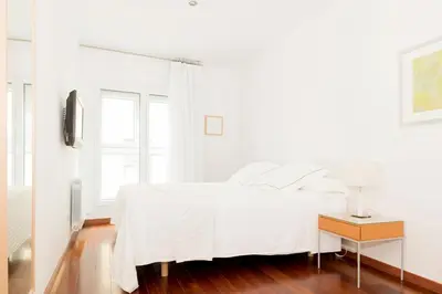 Cama o camas de una habitación en Apartamentos Sabinas El Pilar