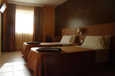 Cama o camas de una habitación en Hotel Solsona Centre