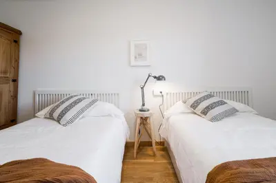 Cama o camas de una habitación en Apartamento Ático Bardenas
