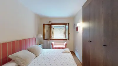 Cama o camas de una habitación en Los Altos de Escarrilla - tucasaenlospirineos