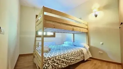 Cama o camas de una habitación en Los Altos de Escarrilla - tucasaenlospirineos