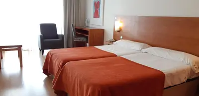Cama o camas de una habitación en Hotel Torre Monreal