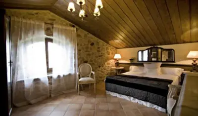 Cama o camas de una habitación en Casa rural l'Avellana