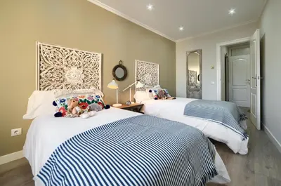 Cama o camas de una habitación en Apartamentos4U Tudela Centro - Parking incluido