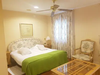 Cama o camas de una habitación en Hotel del Carme