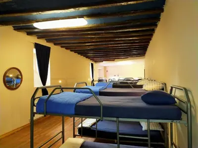 Cama o camas de una habitación en ALBERGUE CASA BAZTAN
