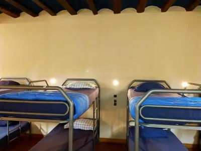 Cama o camas de una habitación en ALBERGUE CASA BAZTAN