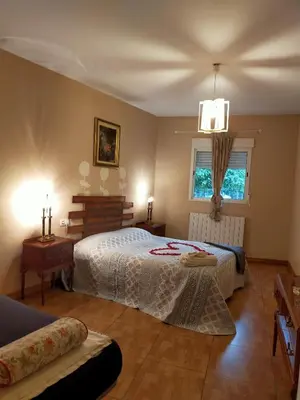 Cama o camas de una habitación en ALBERGUE CASA BAZTAN