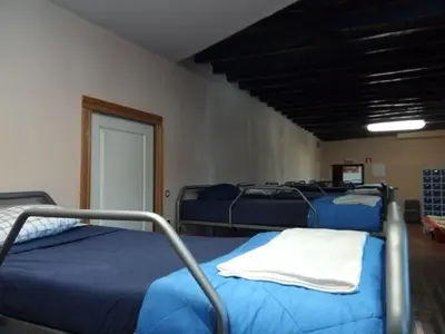 Cama o camas de una habitación en ALBERGUE CASA BAZTAN