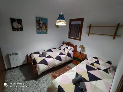 Cama o camas de una habitación en Cal Jardiner