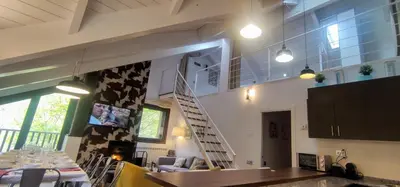 Una televisión o centro de entretenimiento en Pleta del Mon Atico