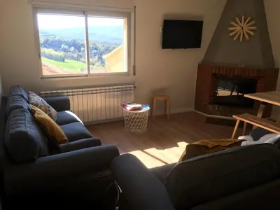 Zona de estar de Apartaments La Pertusa 1r piso