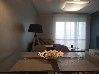 Una televisión o centro de entretenimiento en Apartamento el Budha