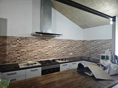 Una cocina o zona de cocina en loft el taller