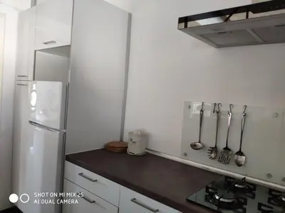 Una cocina o zona de cocina en loft el taller