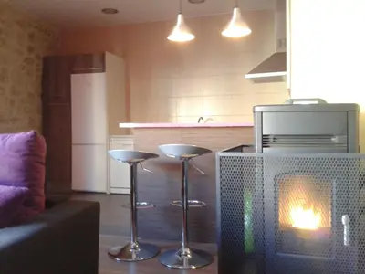 Una cocina o zona de cocina en Apartamentos La Muralla