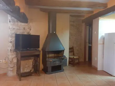 Una televisión o centro de entretenimiento en CASA VICENT